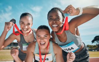 Girl athletes with medals