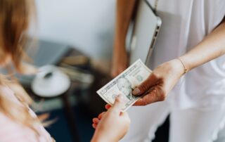 handing over money
