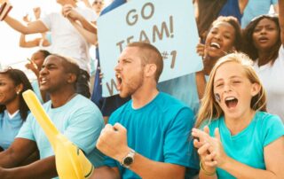 Fans cheering for a team